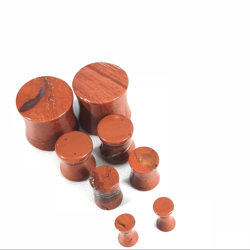 9/16”-0-2g Pair: ORGANIC Red Stone Saddle Plugs
